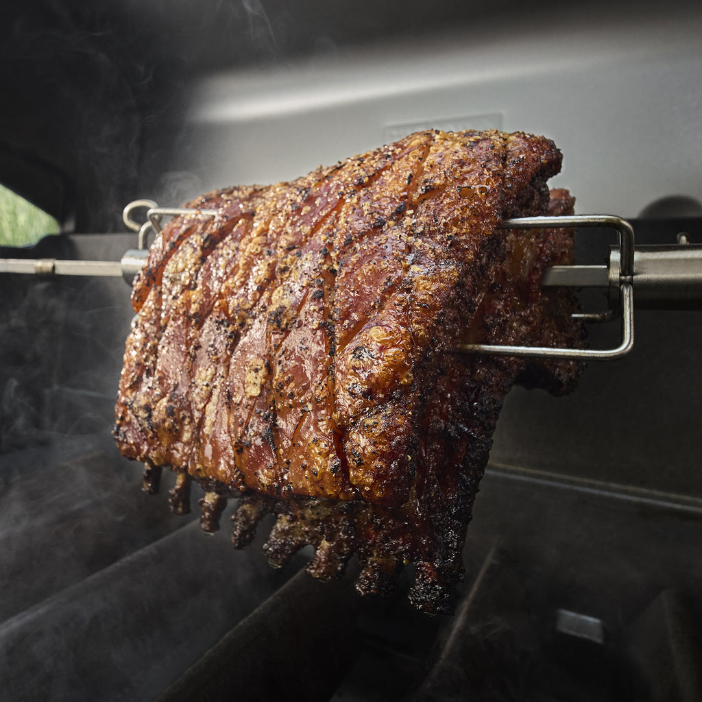 Weber rotisserie in use