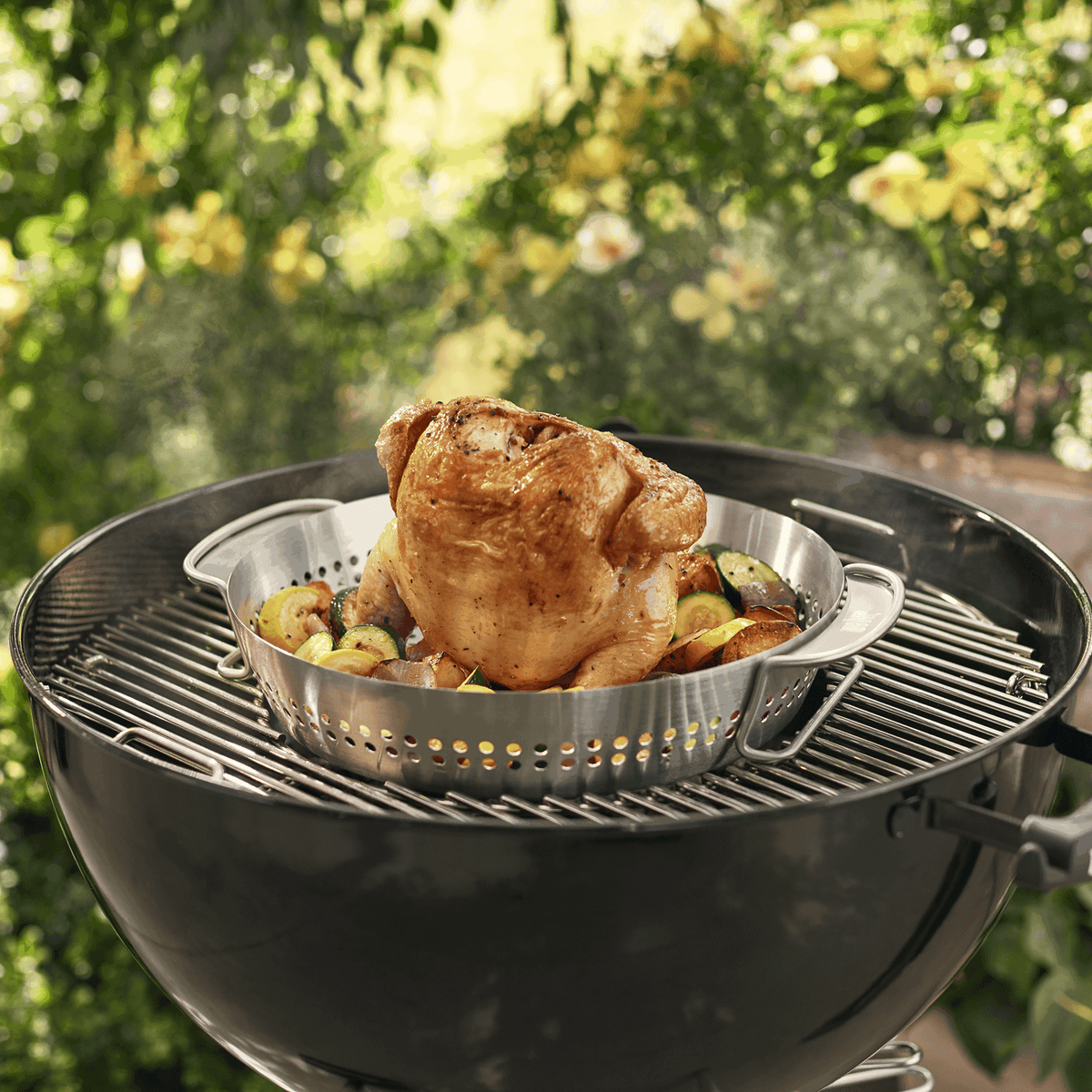 Weber GBS Poultry Roaster in use