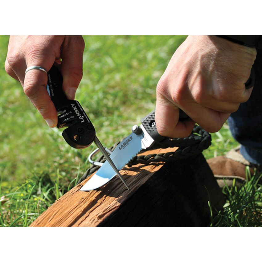Lansky Blademedic in use sharpening a knife outdoors