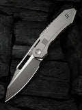 WE Knife Co Bogey folding knife with gray titanium handle