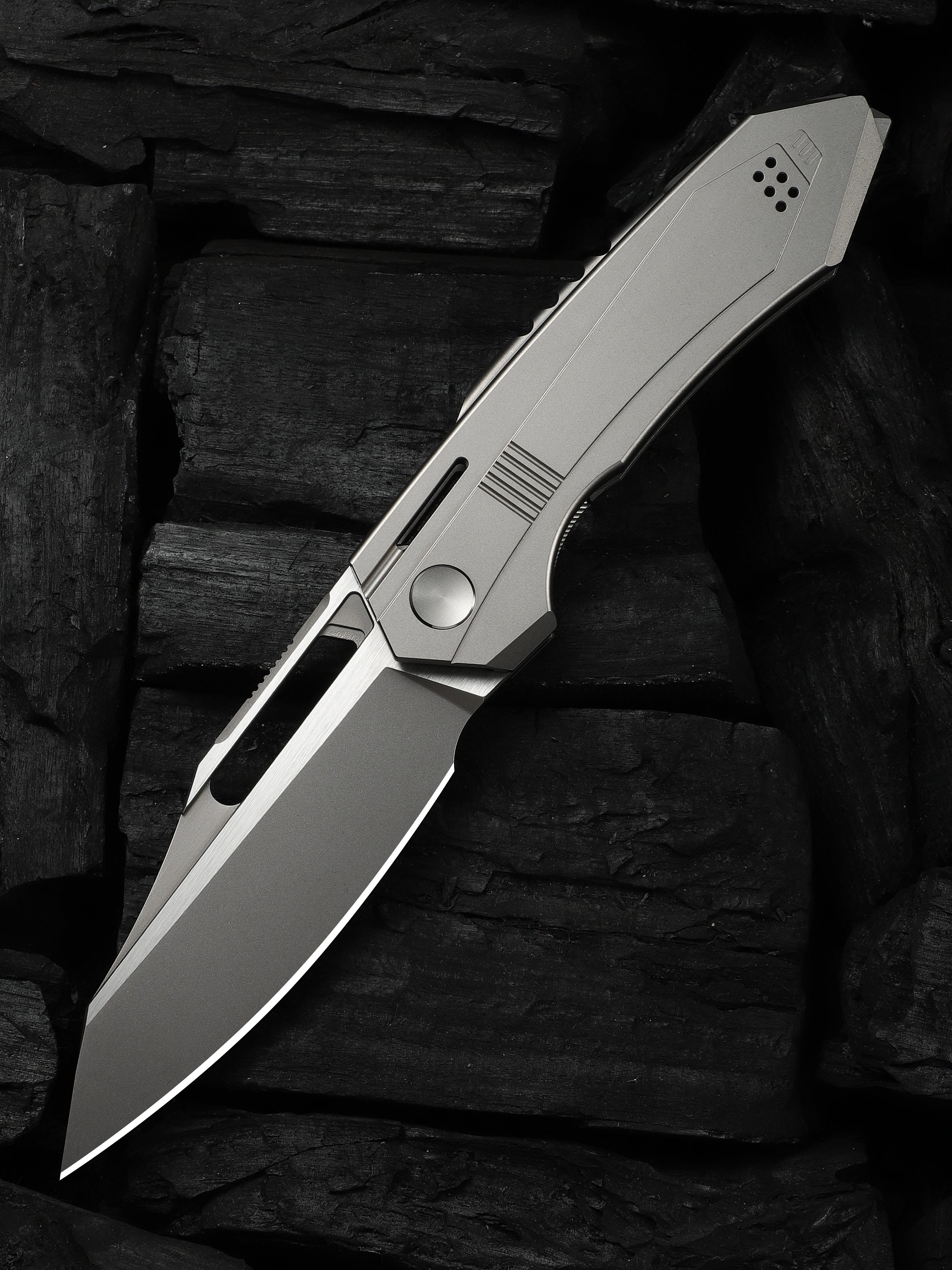 WE Knife Co Bogey folding knife with gray titanium handle