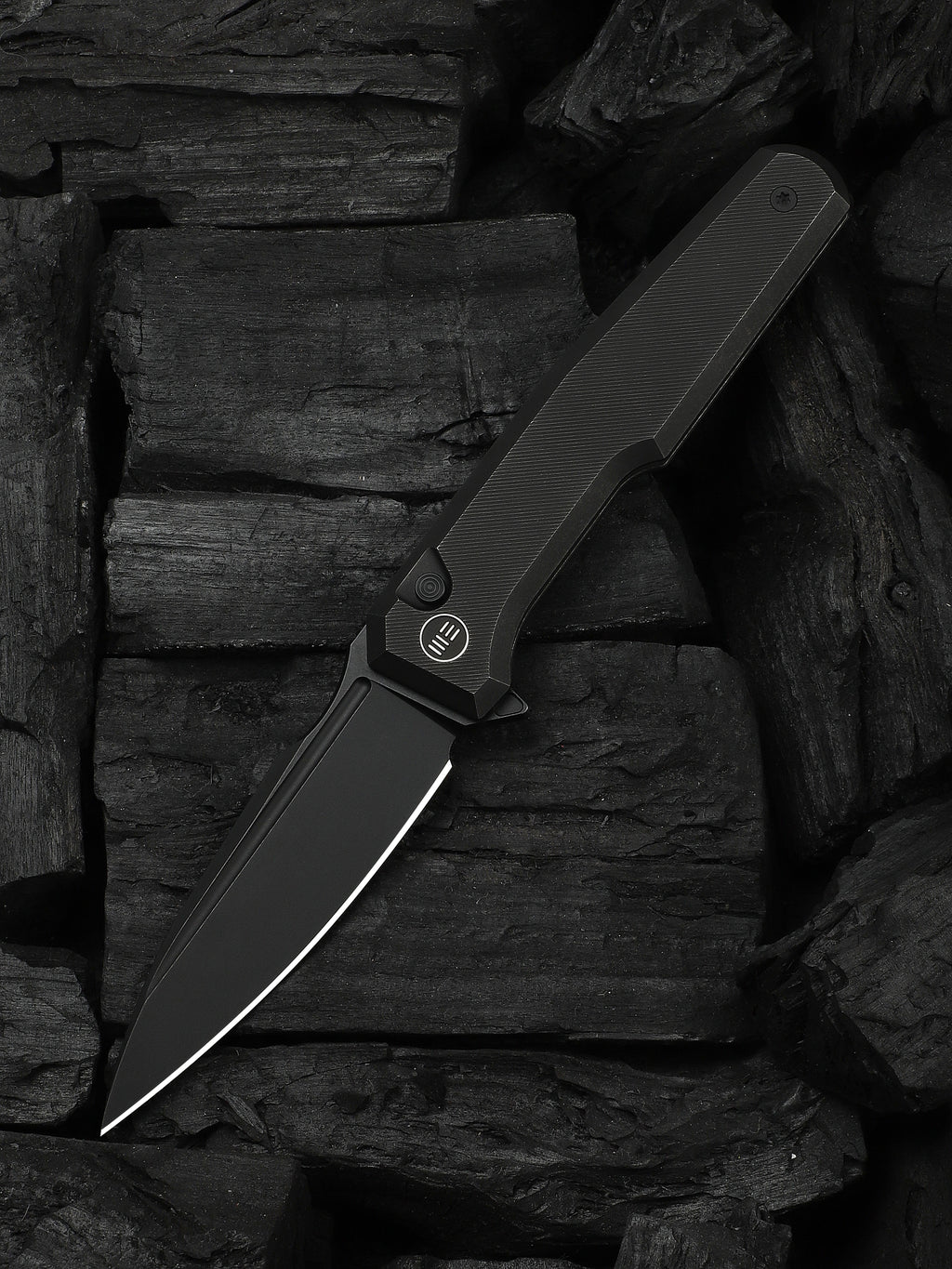 WE Knife Co Dressytak folding knife with black titanium handle and M390 blade