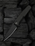 WE Knife Co Dressytak folding knife with black titanium handle and M390 blade
