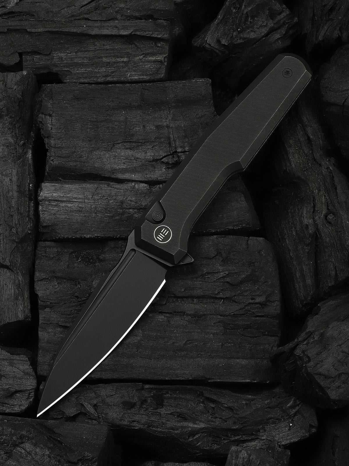 WE Knife Co Dressytak folding knife with black titanium handle and M390 blade