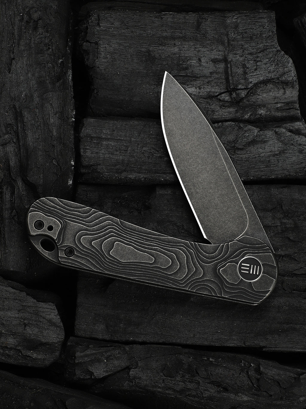 WE Elementum folding knife with black titanium handle, view 3