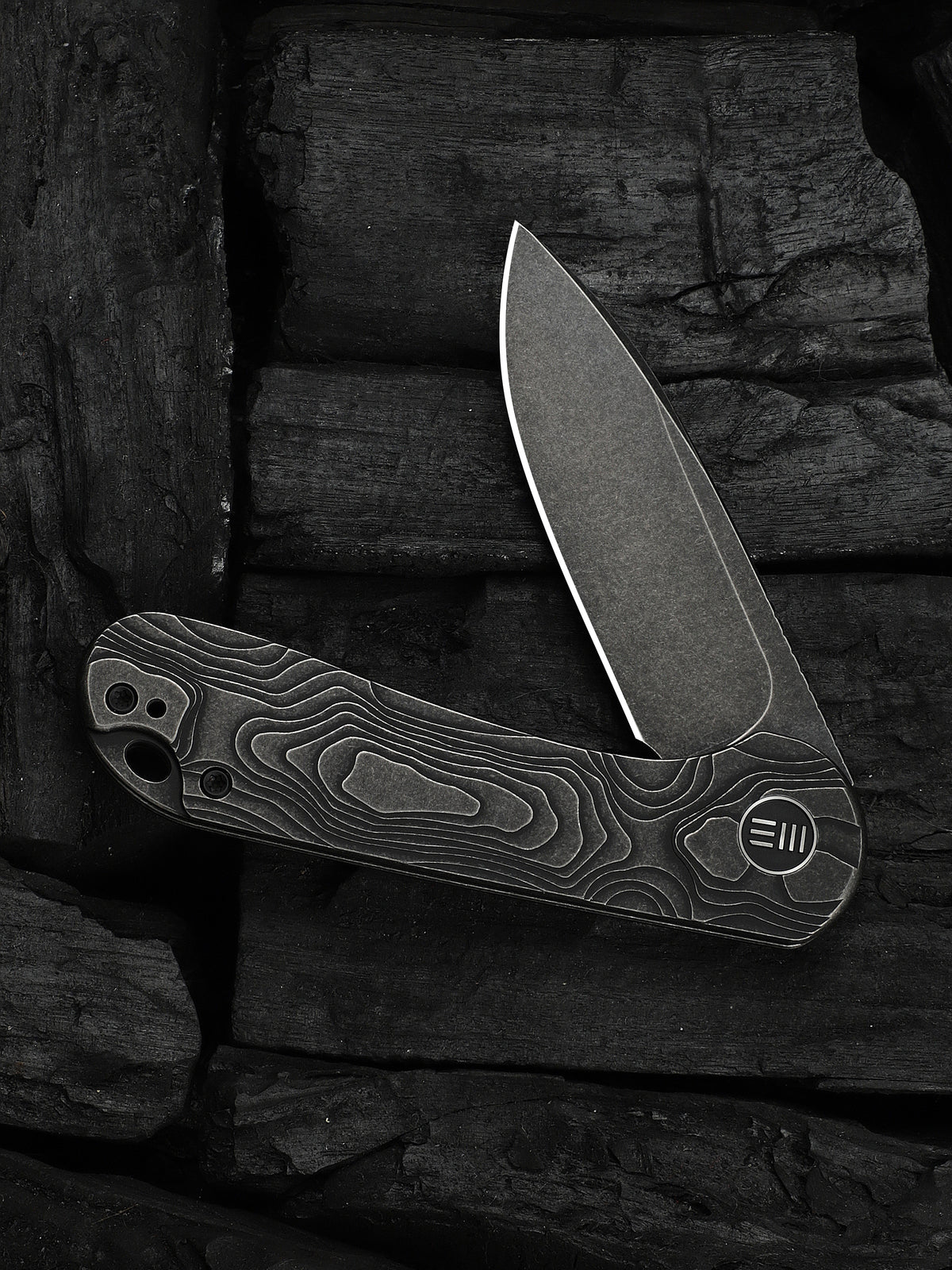 WE Elementum folding knife with black titanium handle, view 3