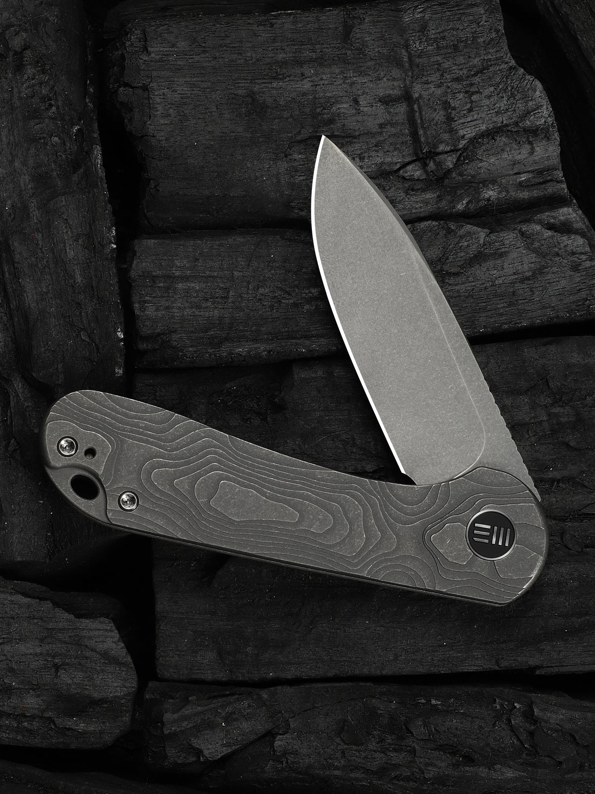 WE Elementum folding knife with gray titanium handle, view 3