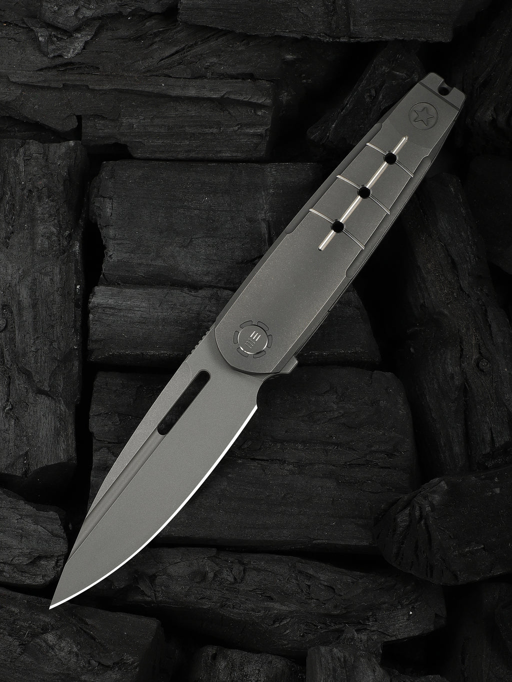 WE Knife Co Hull limited edition folding knife with gray titanium handle and endcap