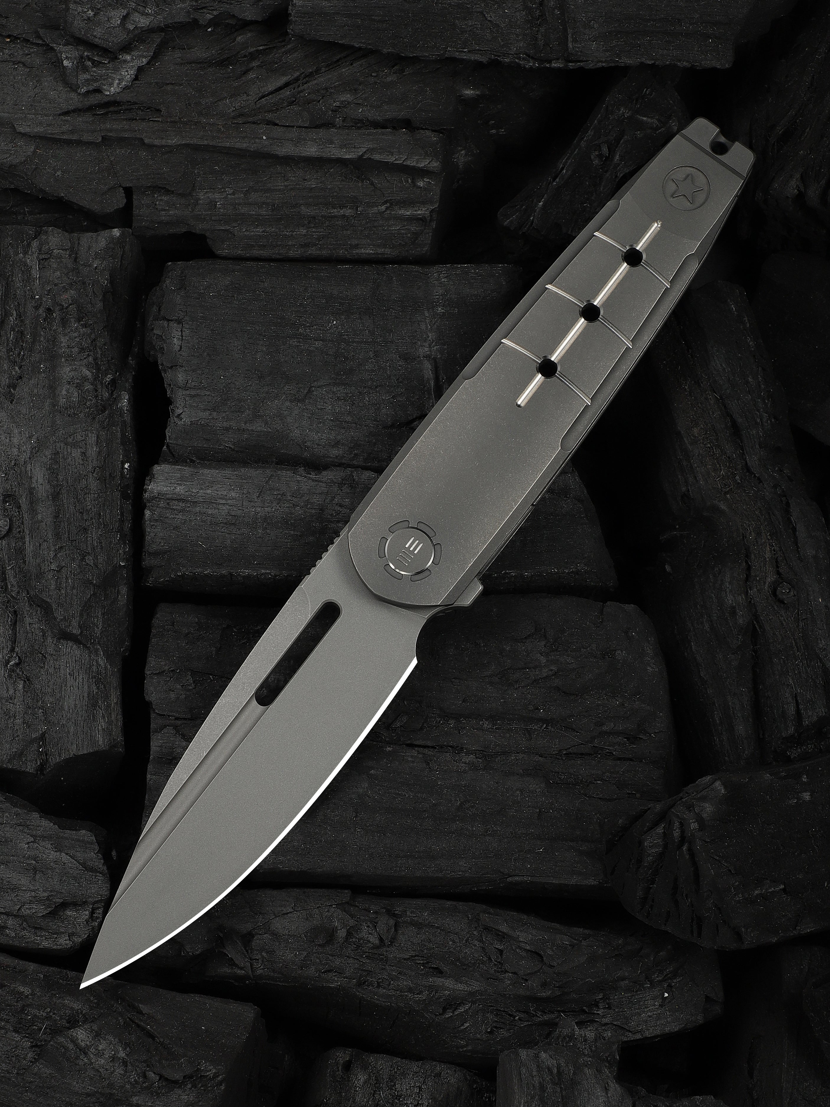 WE Knife Co Hull limited edition folding knife with gray titanium handle and endcap
