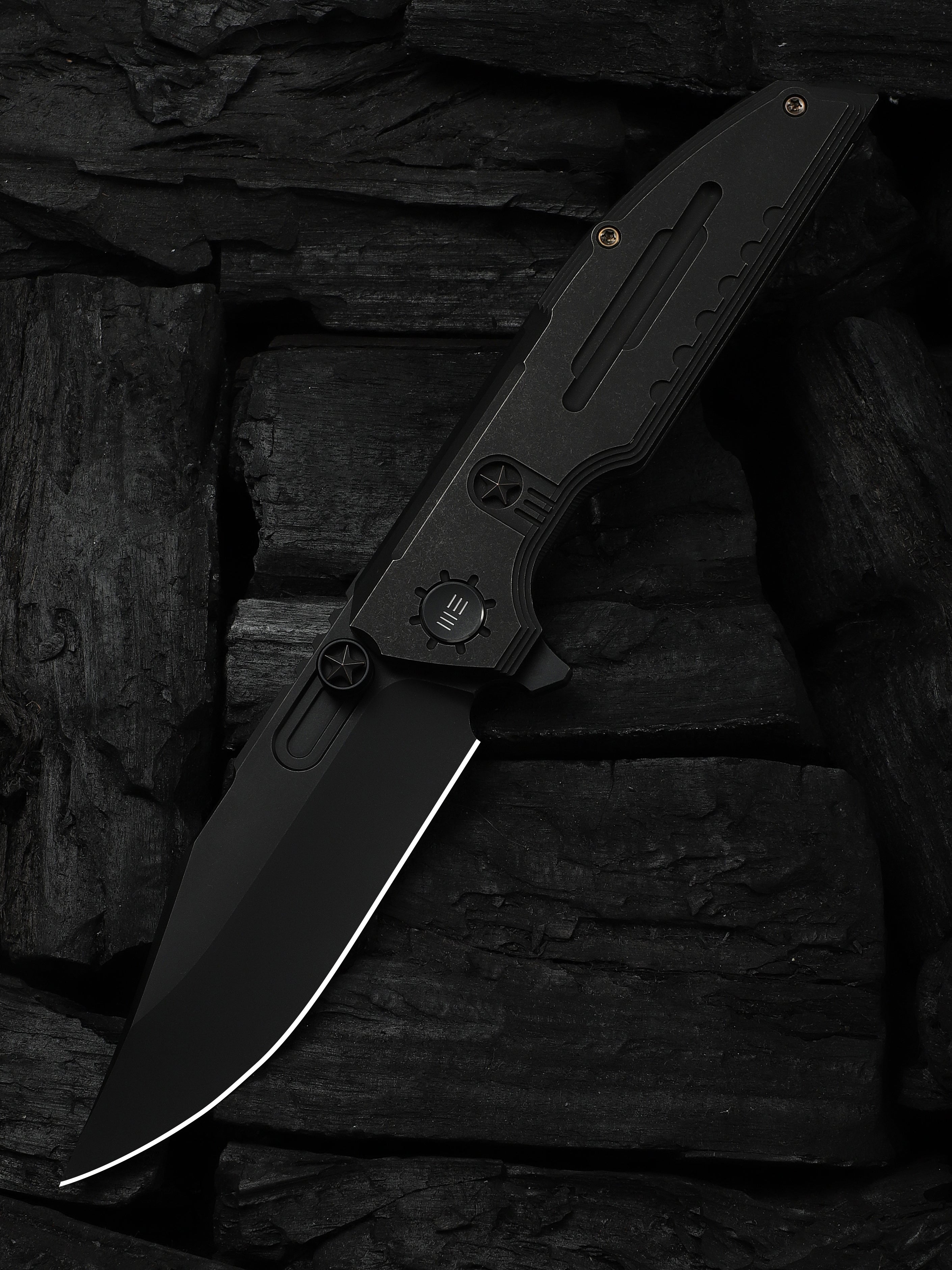 WE Knife Co Muster folding knife with black titanium handle