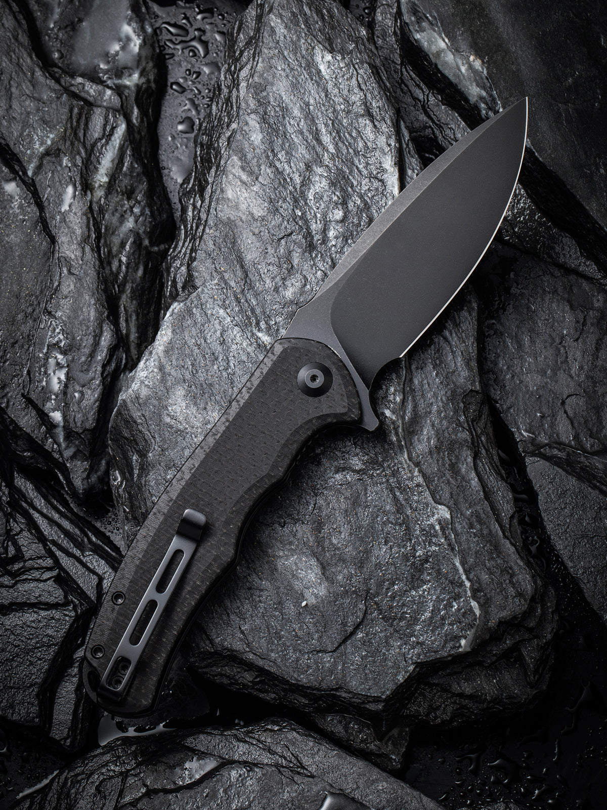 CIVIVI Praxis folding knife with black coarse Micarta handle, view 2