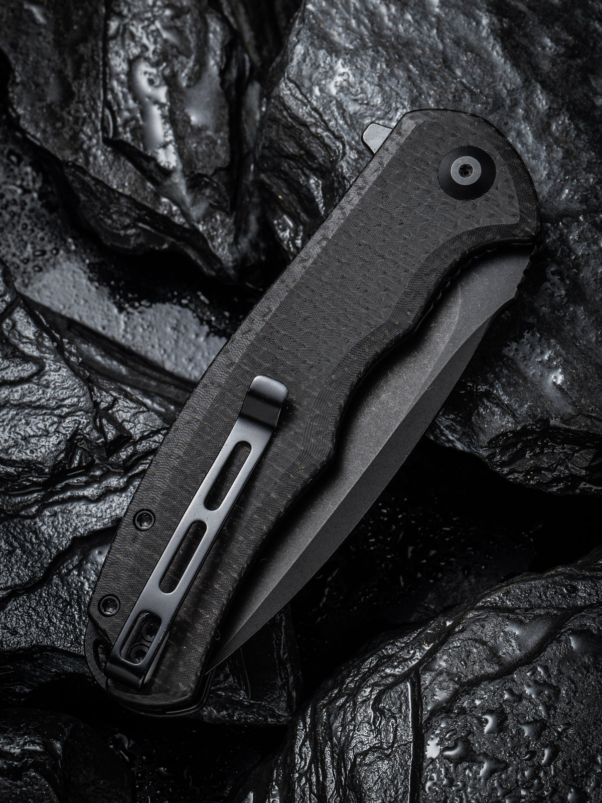 CIVIVI Praxis folding knife with black coarse Micarta handle, view 4