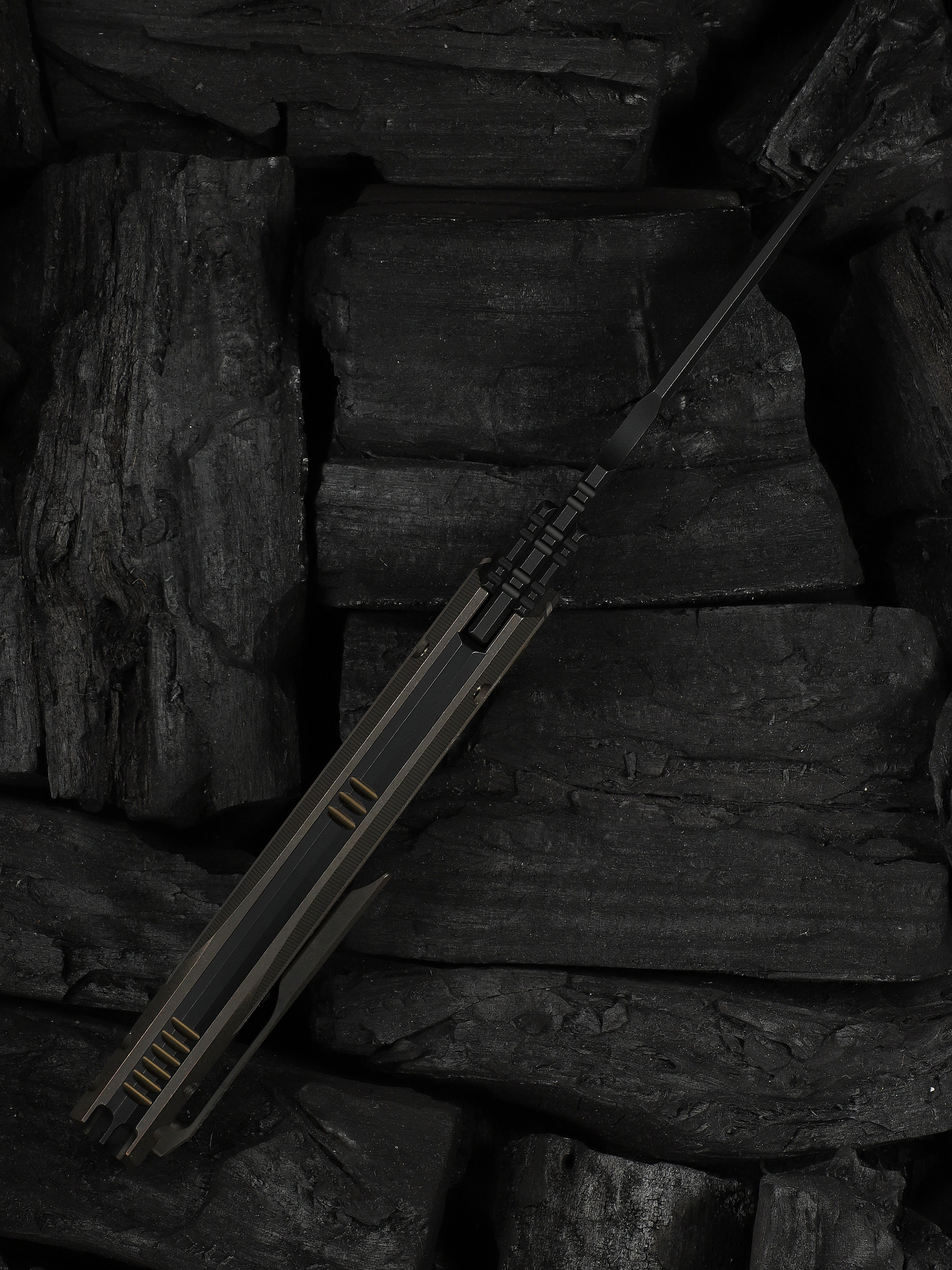 WE Reveille — Bronze Titanium